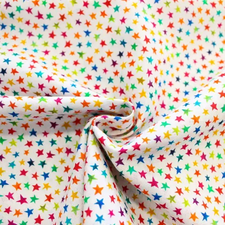 Tessuto di cotone stelline multicolor | TESSUTI PER BAMBINI