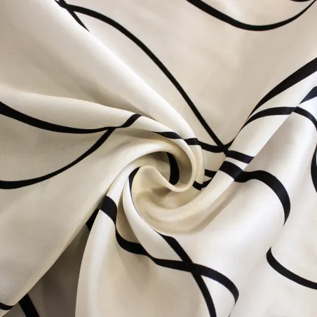 Raso con stampa astratta bianco nero | IL TESSUTAIO