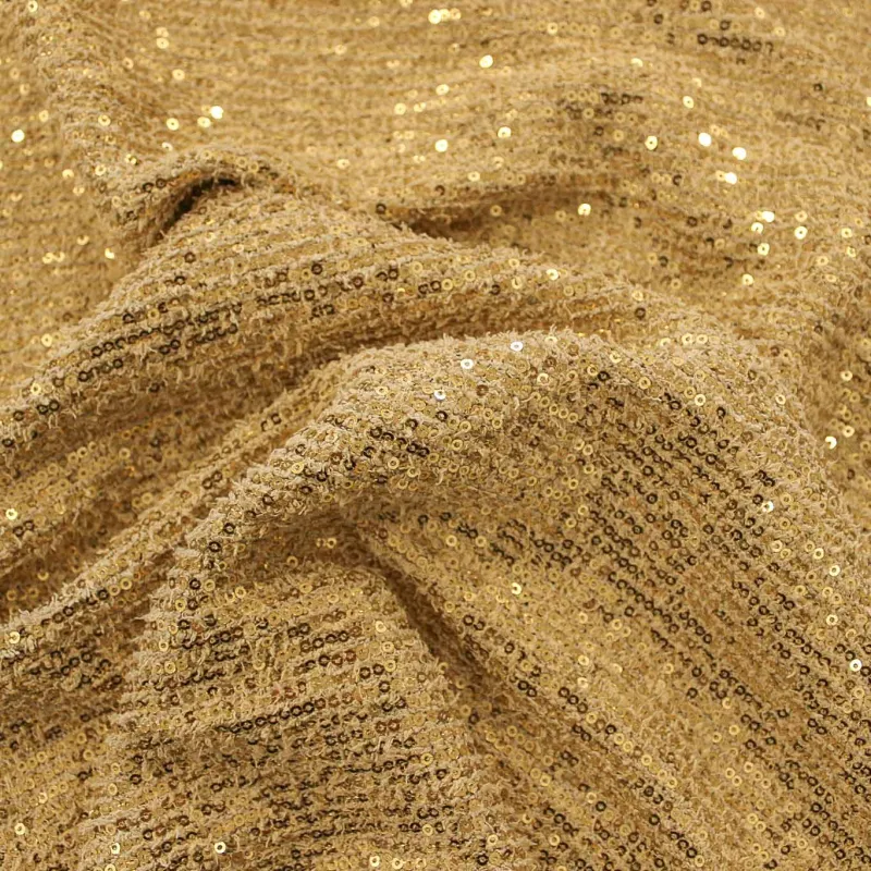 Tessuto a maglia con paillettes oro | IL TESSUTAIO
