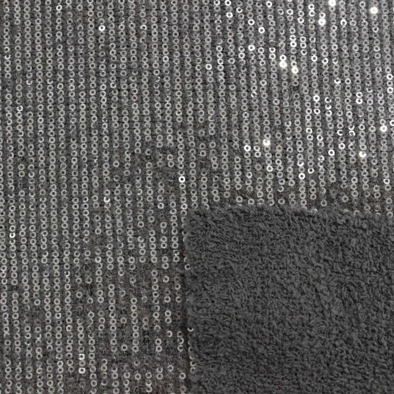 Tessuto a maglia con paillettes argento | IL TESSUTAIO