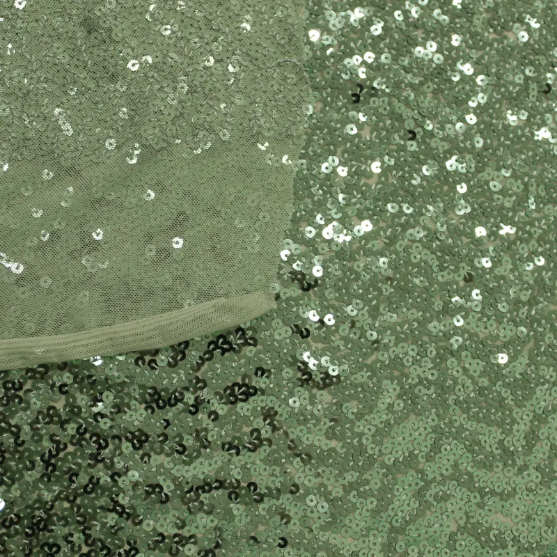 Tessuto con Paillettes verde chiaro | IL TESSUTAIO
