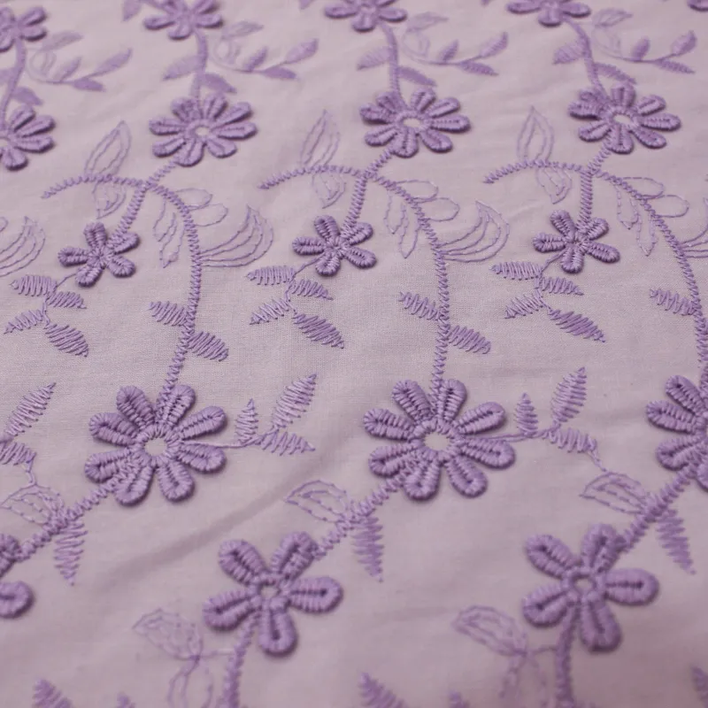 Tessuto pizzo San gallo lilla | abbigliamento bambini