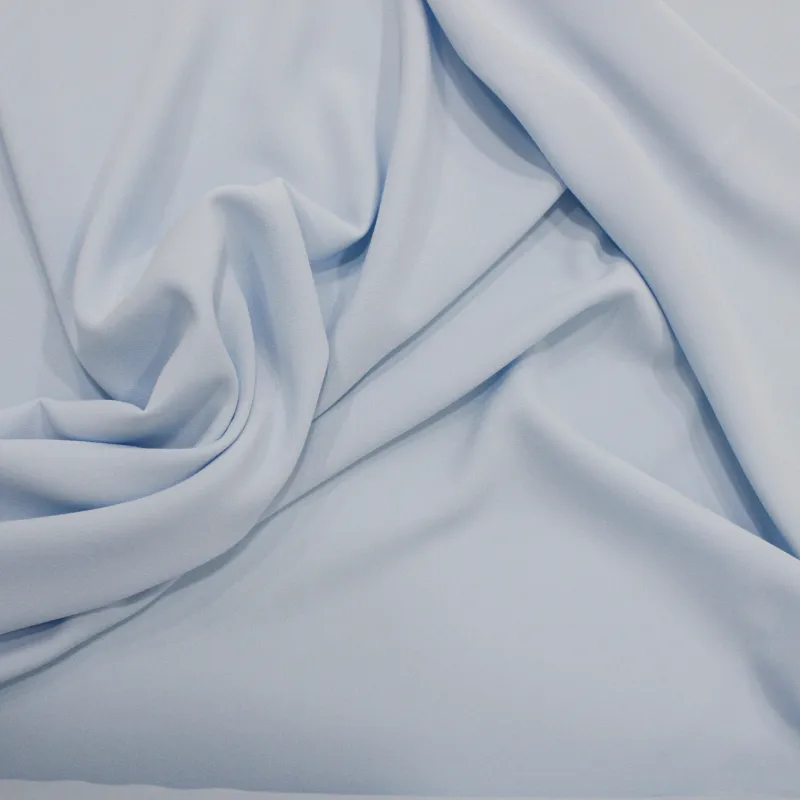 Tessuto crepe celeste | TESSUTI CERIMONIA