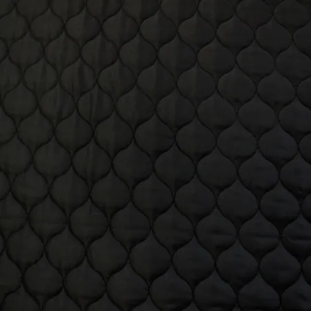 Tessuto trapuntato nero | tessuti per copertine e giubbini