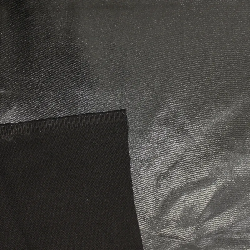 Gabarden di cotone spalmato nero | Tessuti pregiati