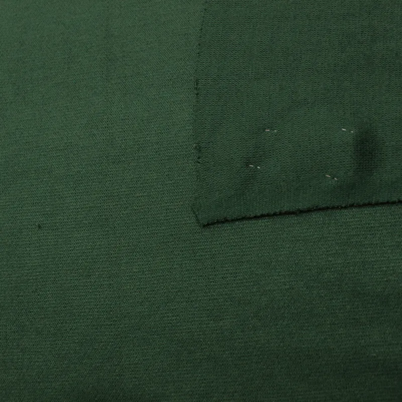 Caldo tessuto a maglia di colore verde | IL TESSUTAIO