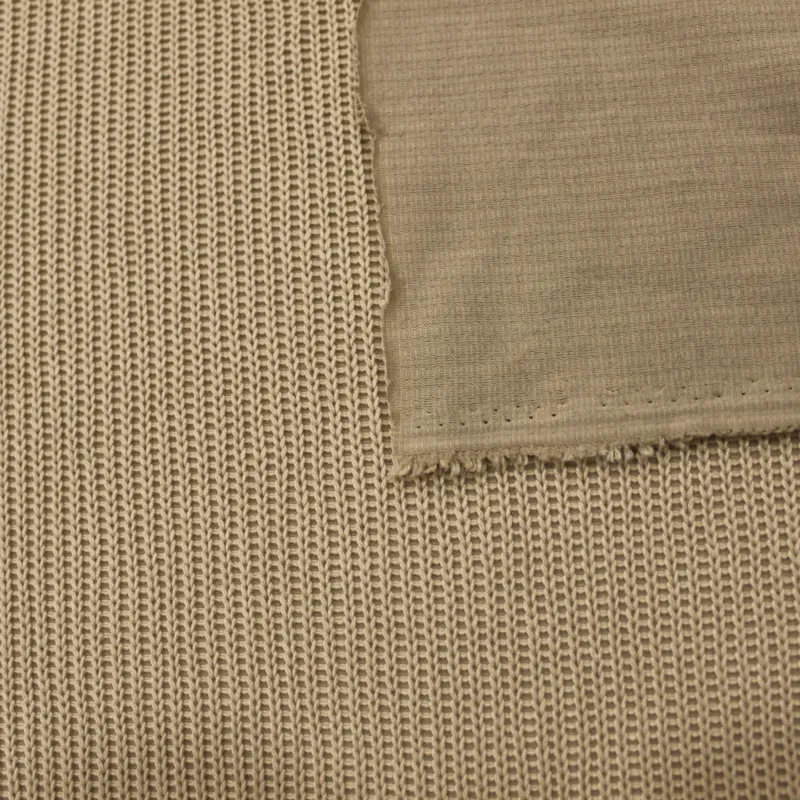 Caldo tessuto in maglia di colore beige | IL TESSUTAIO