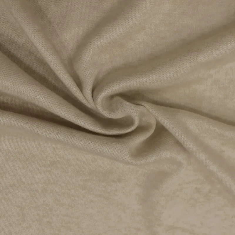 Caldo tessuto a maglia di colore beige  IL TESSUTAIO