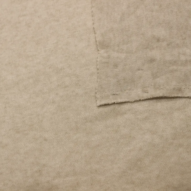 Caldo tessuto a maglia di colore beige  IL TESSUTAIO