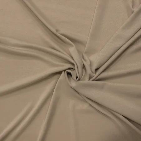 Tessuto in maglina elastica  di colore beige | ILTESSUTAIO