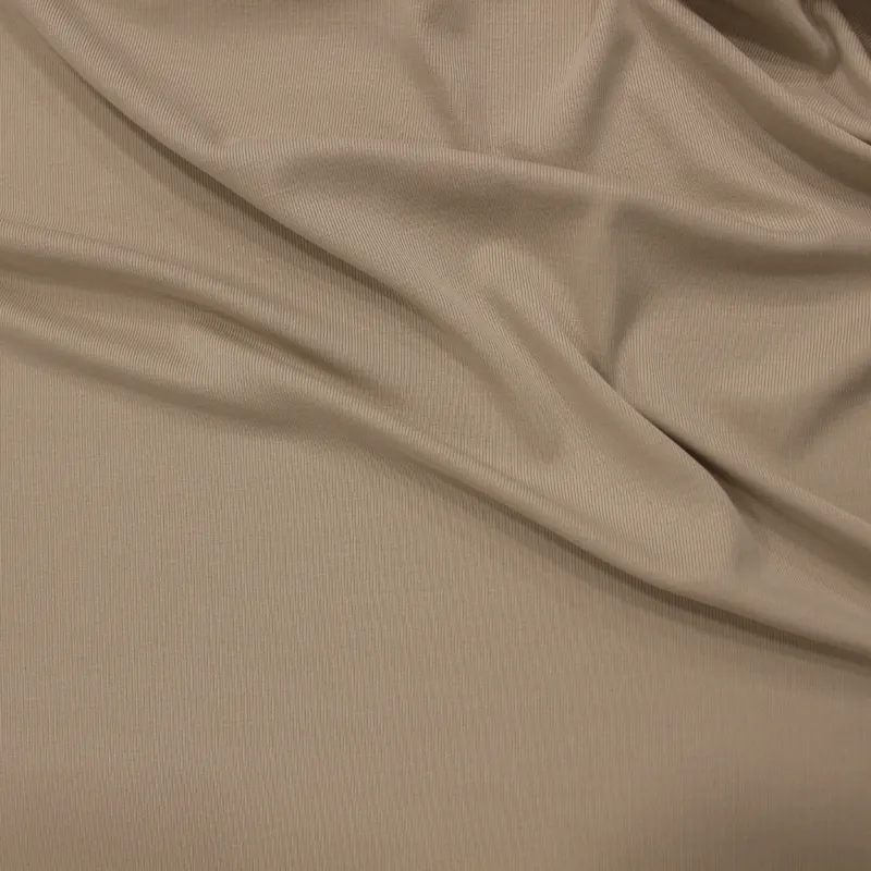 Tessuto in maglina elastica  di colore beige | ILTESSUTAIO
