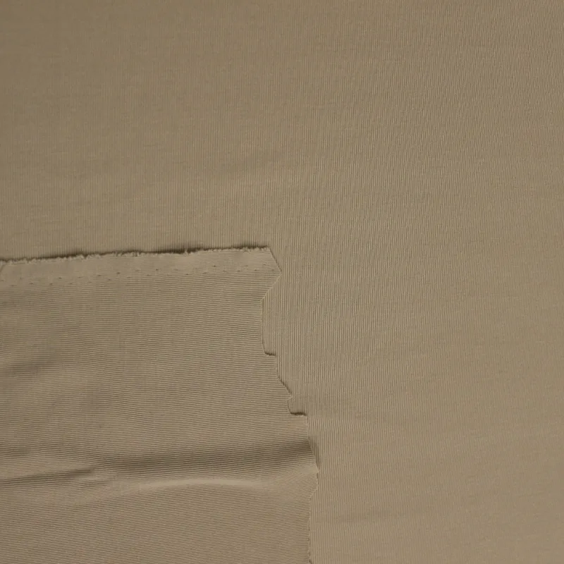 Tessuto in maglina elastica  di colore beige | ILTESSUTAIO