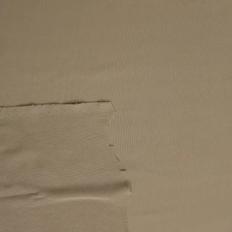 Tessuto in maglina elastica  di colore beige | ILTESSUTAIO