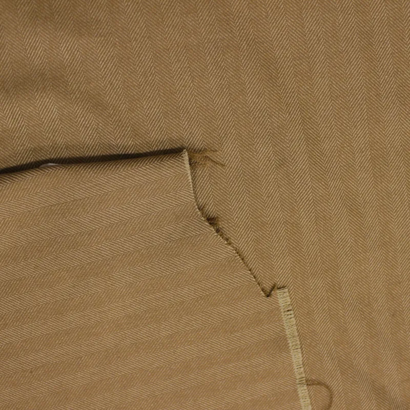 Tessuto poliviscosa spigato grigio   | IL TESSUTAIO