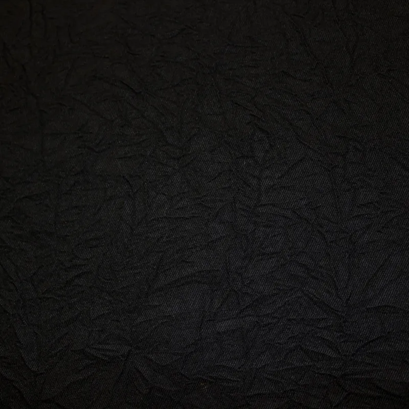 Tessuto poliviscosa grinzato  nero  | tessuto per pantaloni e giacca