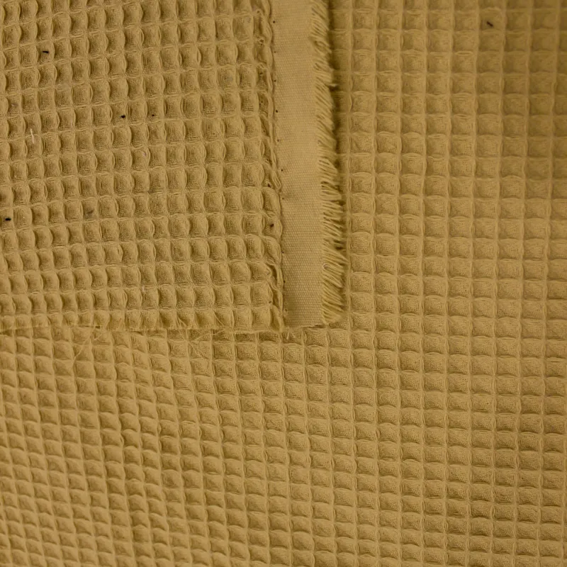 Tessuto waffle in cotone beige| abbigliamento bambini | IL TESSUTAIO