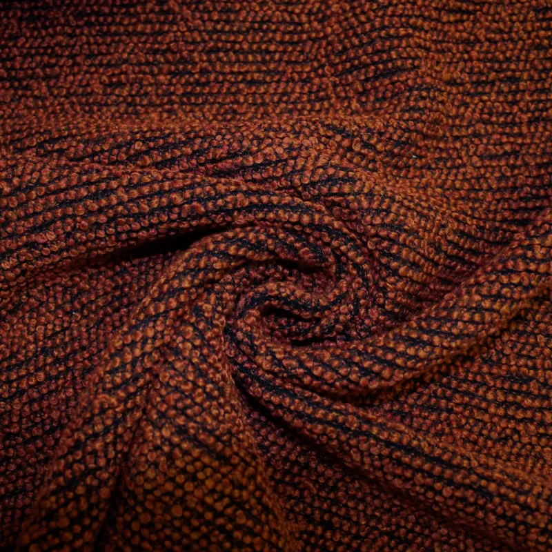 Morbido boucle' arancio scuro e nero | tessuti deadstock