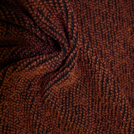 Morbido boucle' arancio scuro e nero | tessuti deadstock