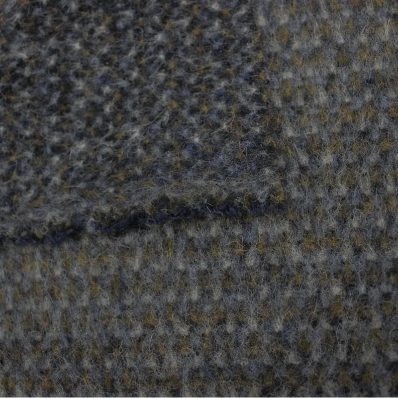 Tessuto per cappotto deadstock di colore blu puntinato