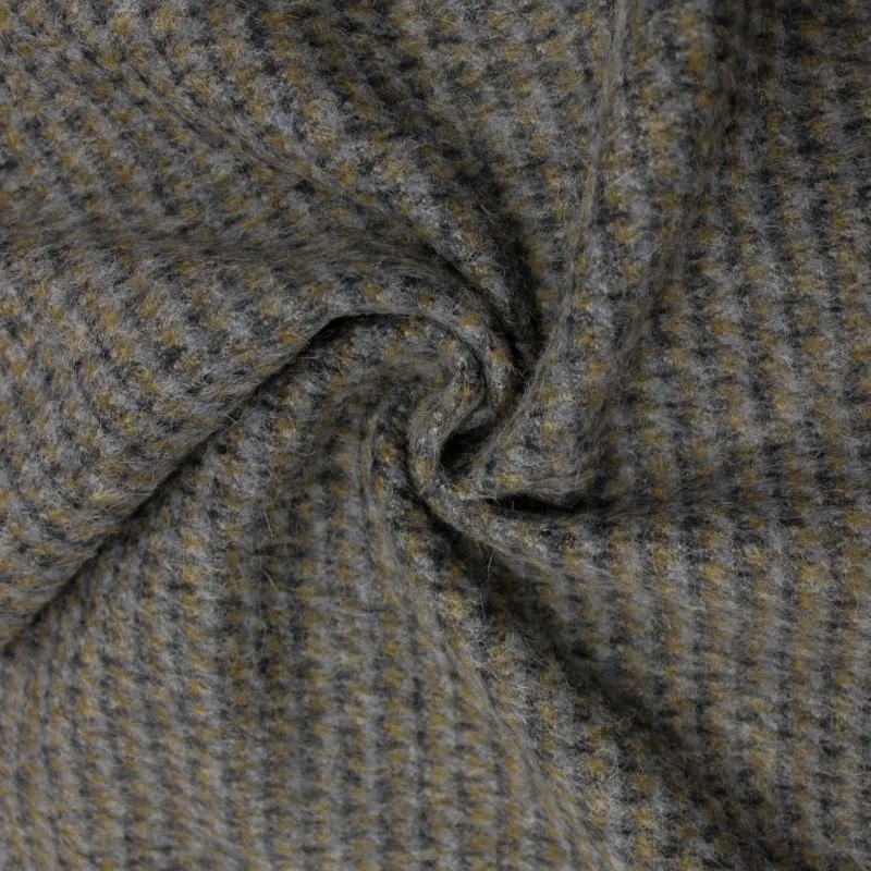 Tessuto per cappotto puntinato grigio in lana
