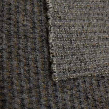 Tessuto per cappotto puntinato grigio in lana