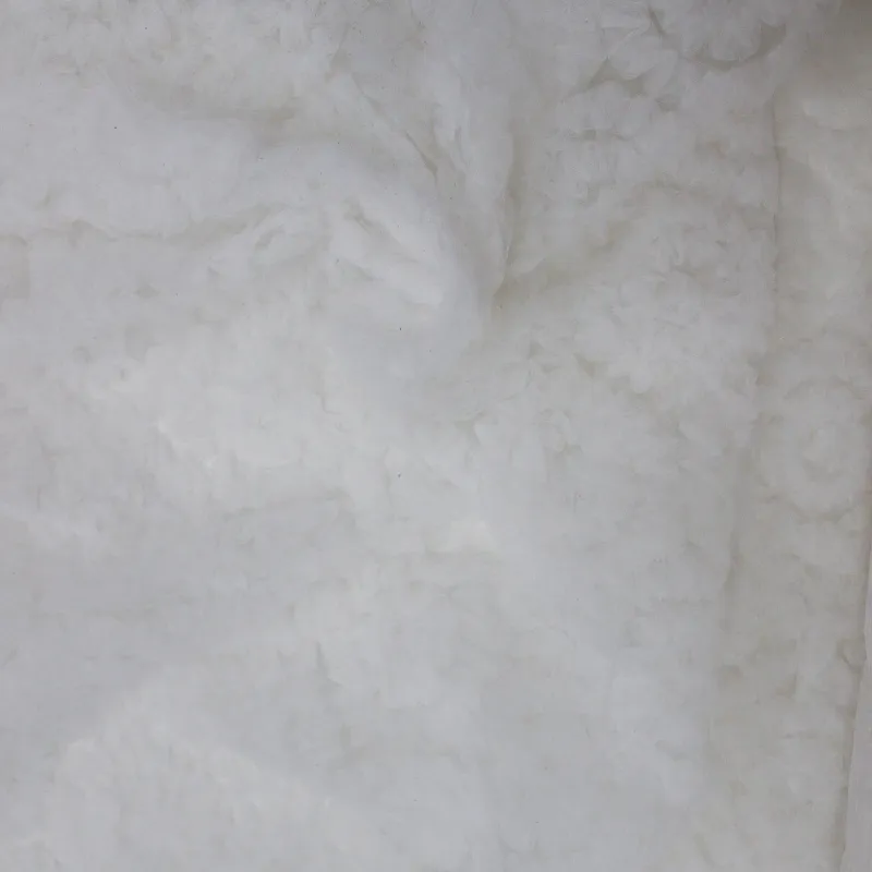 Tessuto Tulle Fiori 3D colore bianco  | IL TESSUTAIO