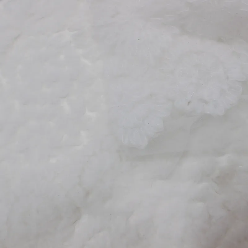 Tessuto Tulle Fiori 3D colore bianco  | IL TESSUTAIO