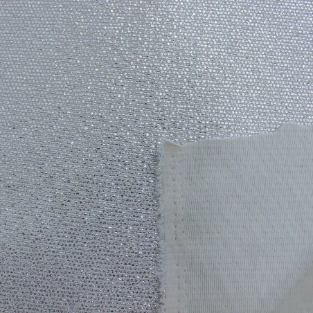 Tessuto in maglia elasticizzata spalmato argento  | tessuti cerimonia
