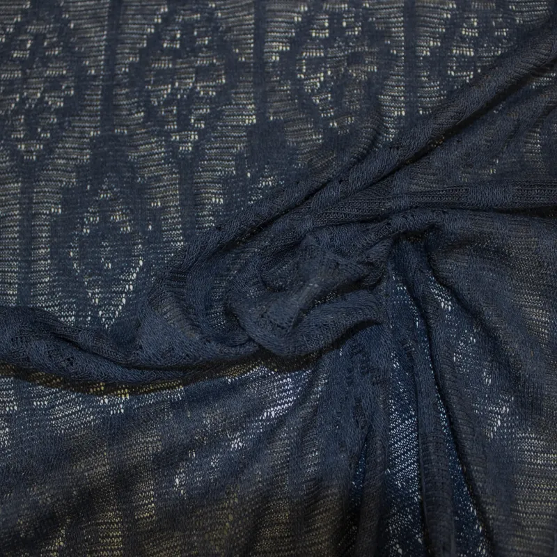 Tessuto a maglia elasticizzata  semi trasparente blu| IL TESSUTAIO