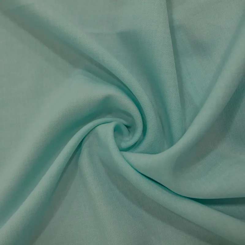Tessuto poliviscosa celeste | abbigliamento donna