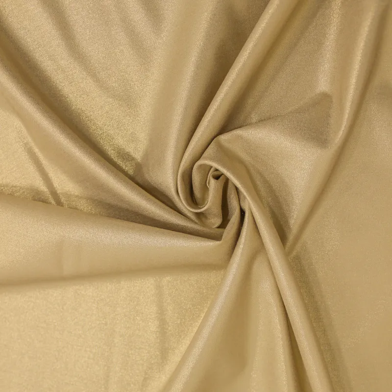 Tessuto poliviscosa spalmato oro | Tessuti Cerimonia  Donna