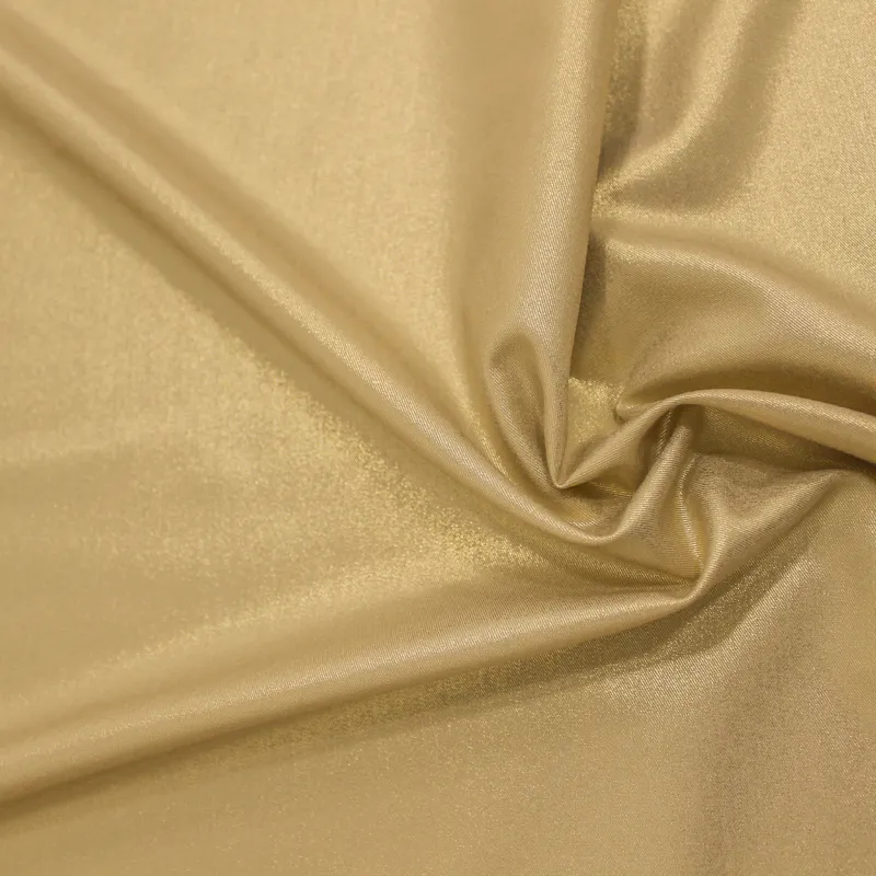 Tessuto poliviscosa spalmato oro | Tessuti Cerimonia  Donna