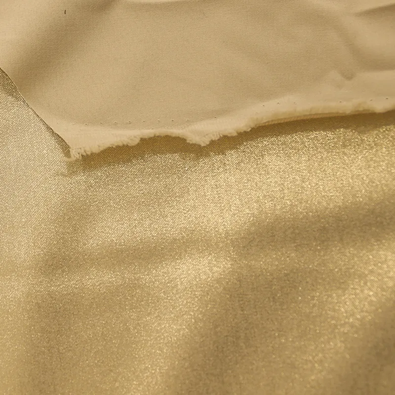 Tessuto poliviscosa spalmato oro | Tessuti Cerimonia  Donna