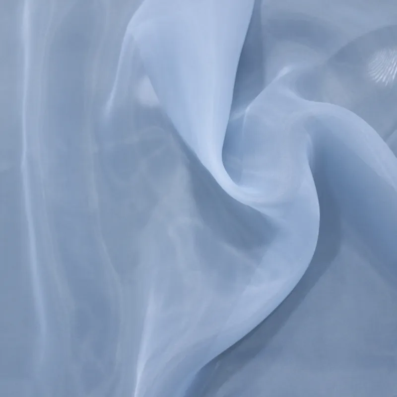 Tessuto Doppia Organza Celeste | Trasparenza e Eleganza per Abiti Sofisticati