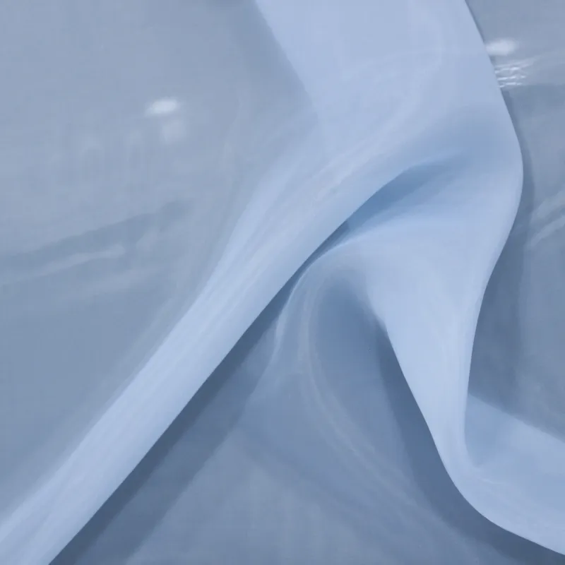 Tessuto Doppia Organza Celeste | Trasparenza e Eleganza per Abiti Sofisticati