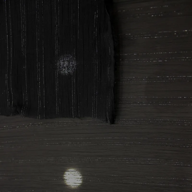 Tessuto Chiffon Rigato Lurex Nero | Leggerezza e Brillantezza per Abiti