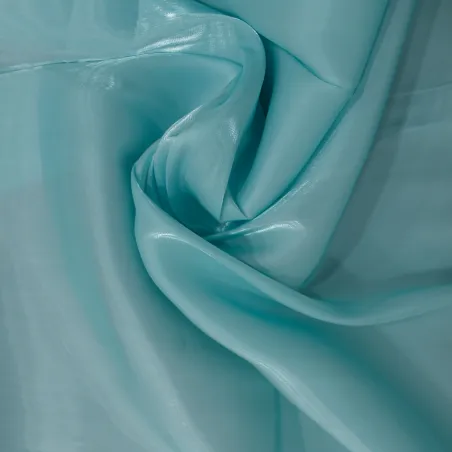 Tessuto raso cangiante azzurro – Eleganza e luminosità per moda