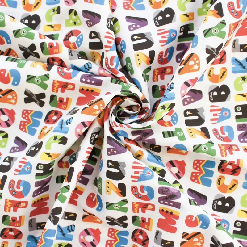 TESSUTO DI COTONE FANTASIA ALFABETO MULTICOLOR-BIMBI
