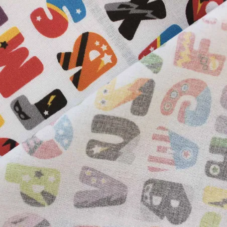 TESSUTO DI COTONE FANTASIA ALFABETO MULTICOLOR-BIMBI