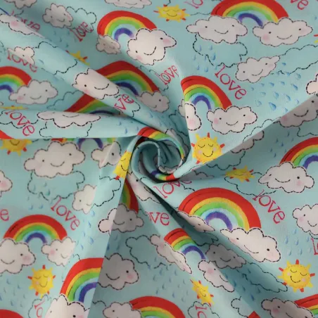 TESSUTO DI COTONE FANTASIA NUVOLE E ARCOBALENI | ILTESSUTAIO.IT