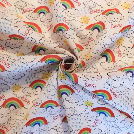 TESSUTO DI COTONE FANTASIA NUVOLE E ARCOBALENI | ILTESSUTAIO.IT