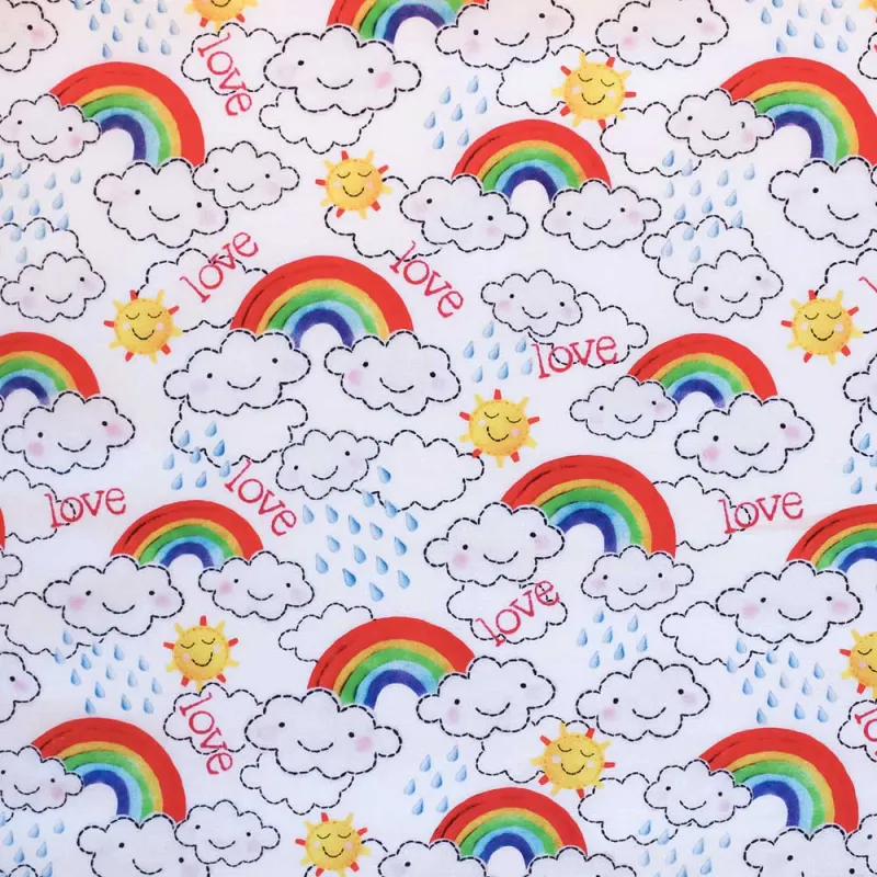 TESSUTO DI COTONE FANTASIA NUVOLE E ARCOBALENI | ILTESSUTAIO.IT