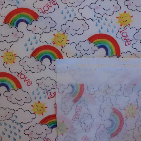 TESSUTO DI COTONE FANTASIA NUVOLE E ARCOBALENI | ILTESSUTAIO.IT
