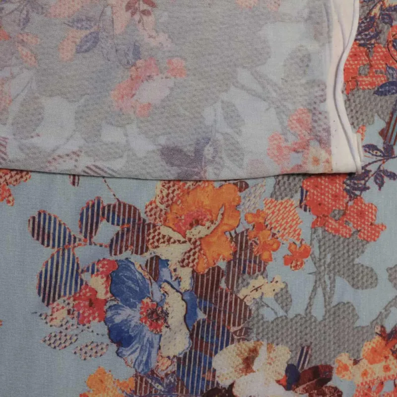 Jersey tessuto di viscosa fantasia floreale celeste | IL TESSUTAIO