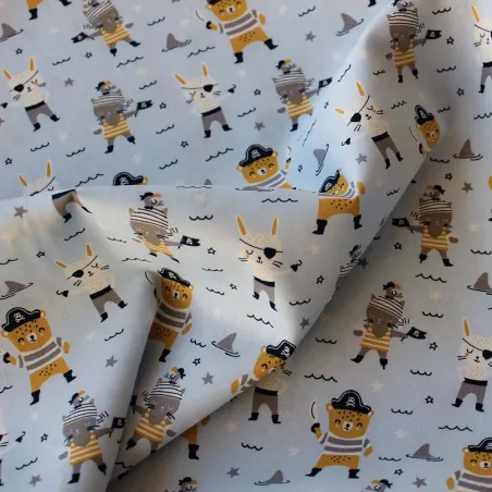 TESSUTO DI COTONE FANTASIA PIRATI / CELESTE- OEKO TEX 100- BY POPPY