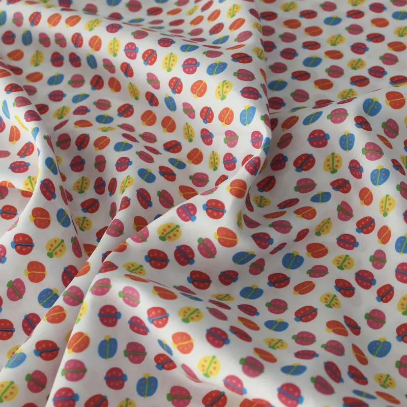 TESSUTO DI COTONE FANTASIA COCCINELLE - TESSUTI PER IL FAI DA TE