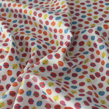 TESSUTO DI COTONE FANTASIA COCCINELLE - TESSUTI PER IL FAI DA TE