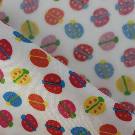TESSUTO DI COTONE FANTASIA COCCINELLE - TESSUTI PER IL FAI DA TE