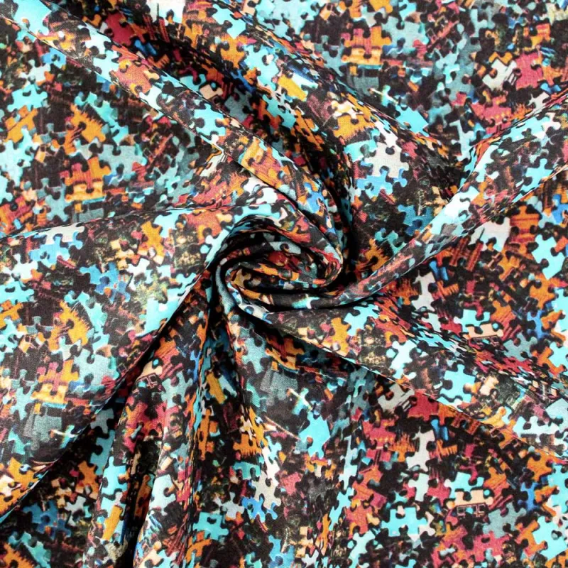 Cotone fantasia Puzzle | tessuti fai da te| iltessutaio