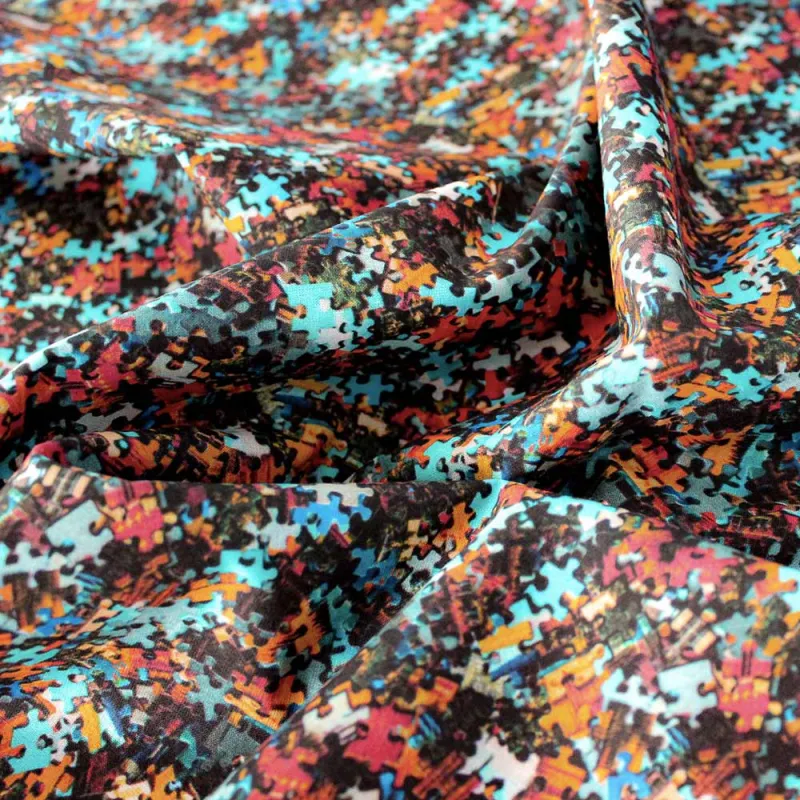 Cotone fantasia Puzzle | tessuti fai da te| iltessutaio